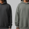 Hoodie size guide hero comparing regular-fit vs oversized fits on Indian models with a clear overlay outline.
